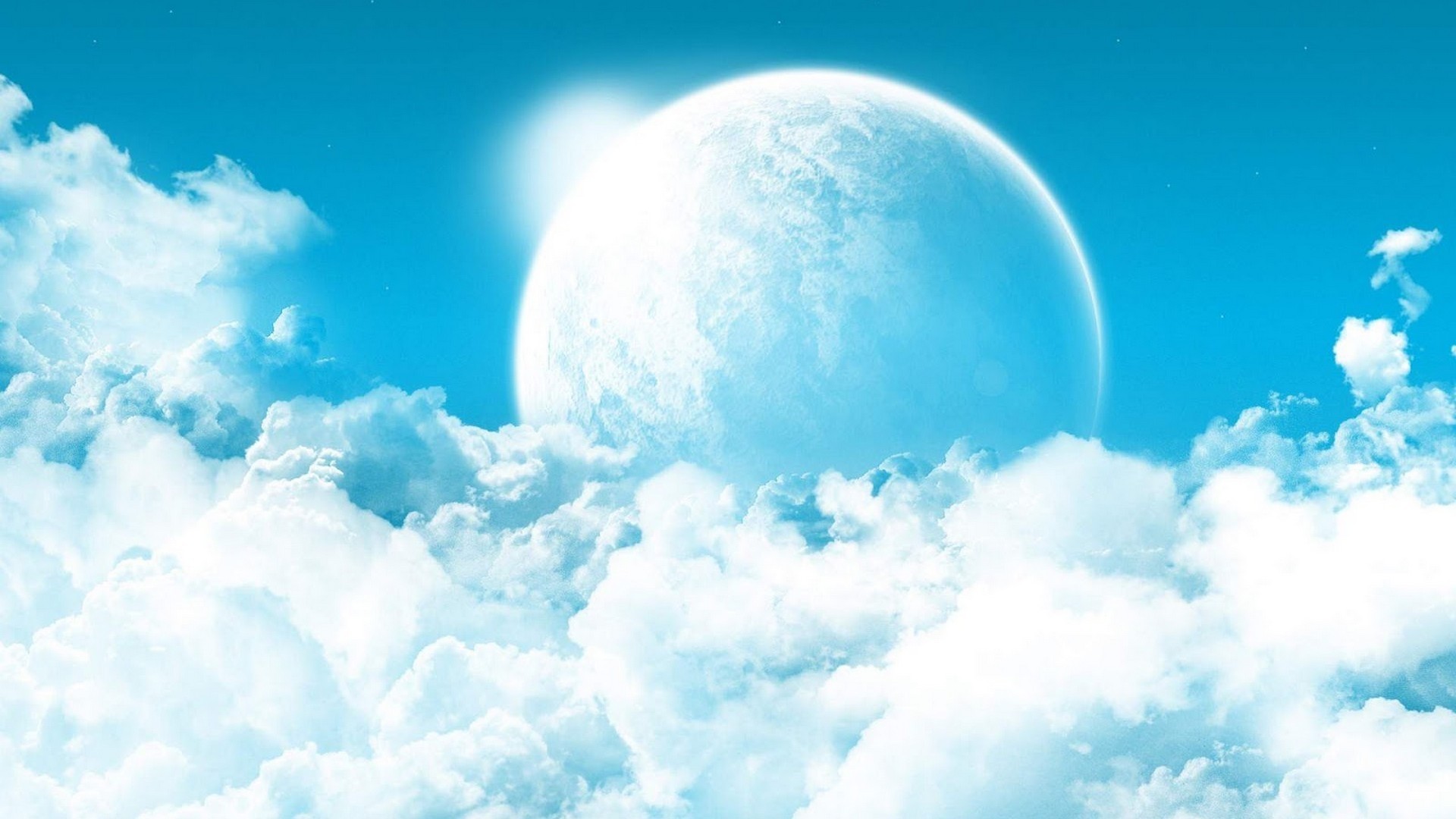 A luminous moon rising through bright clouds